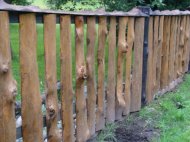 Как построить забор из горбыля?